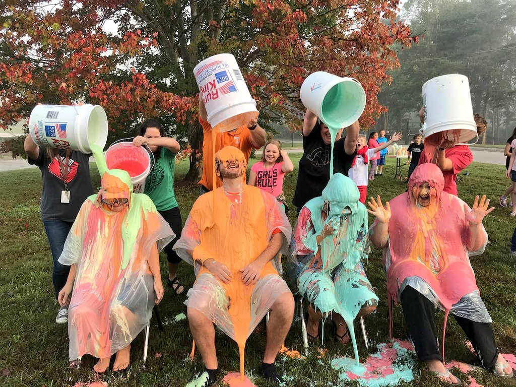 Teachers and administrators at Adrian Burnett Elementary School get 
