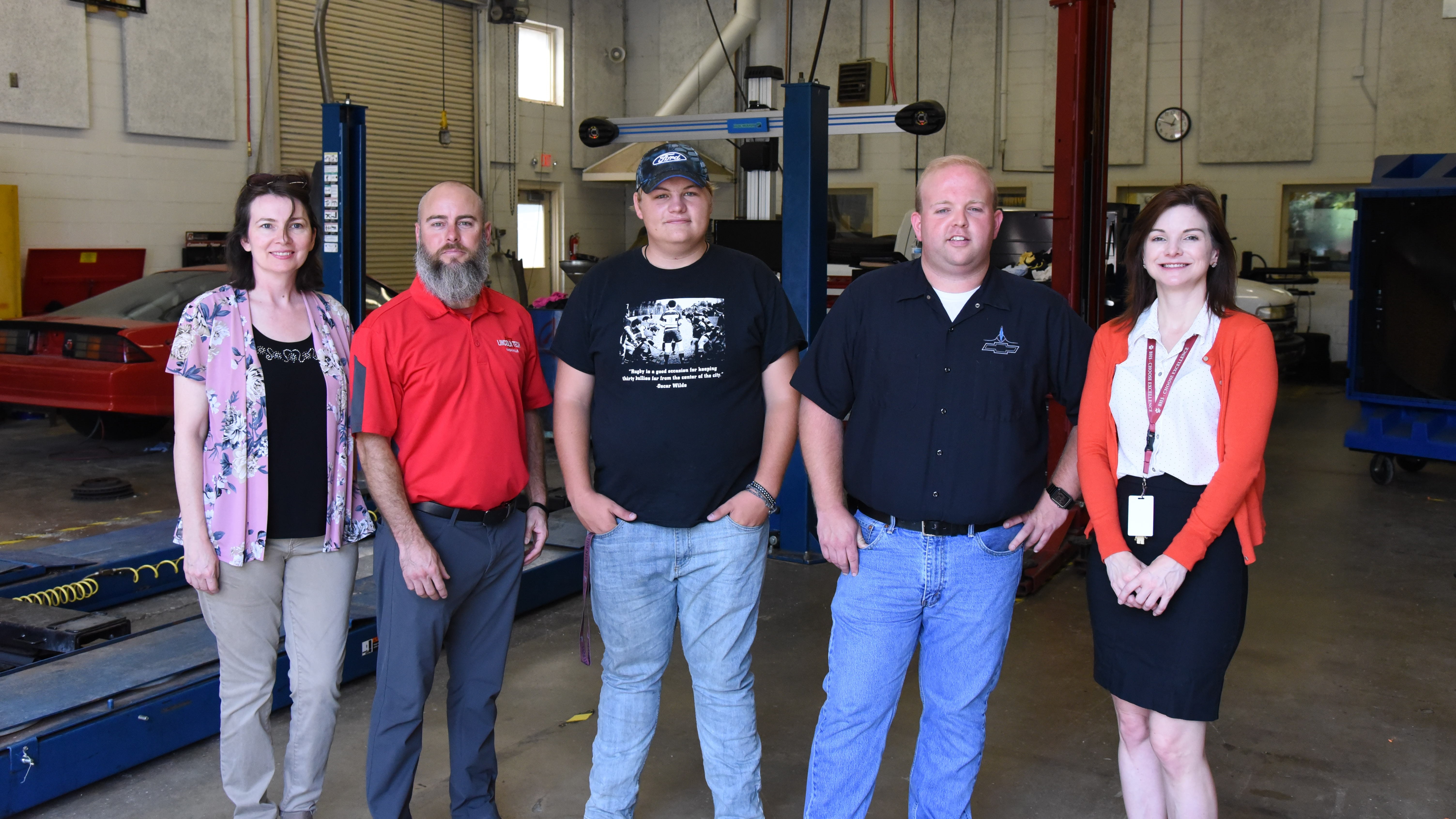 Bearden High School graduate Noah Teffeteller (center) is pictured in the Bearden CTE building with, from left, Maria Richardson, program director of the Top Wrench competition; Marc Bishop, admissions representative, Lincoln College of Technology; Rob Dyer, BHS CTE teacher; and Candace Greer, BHS assistant principal. 