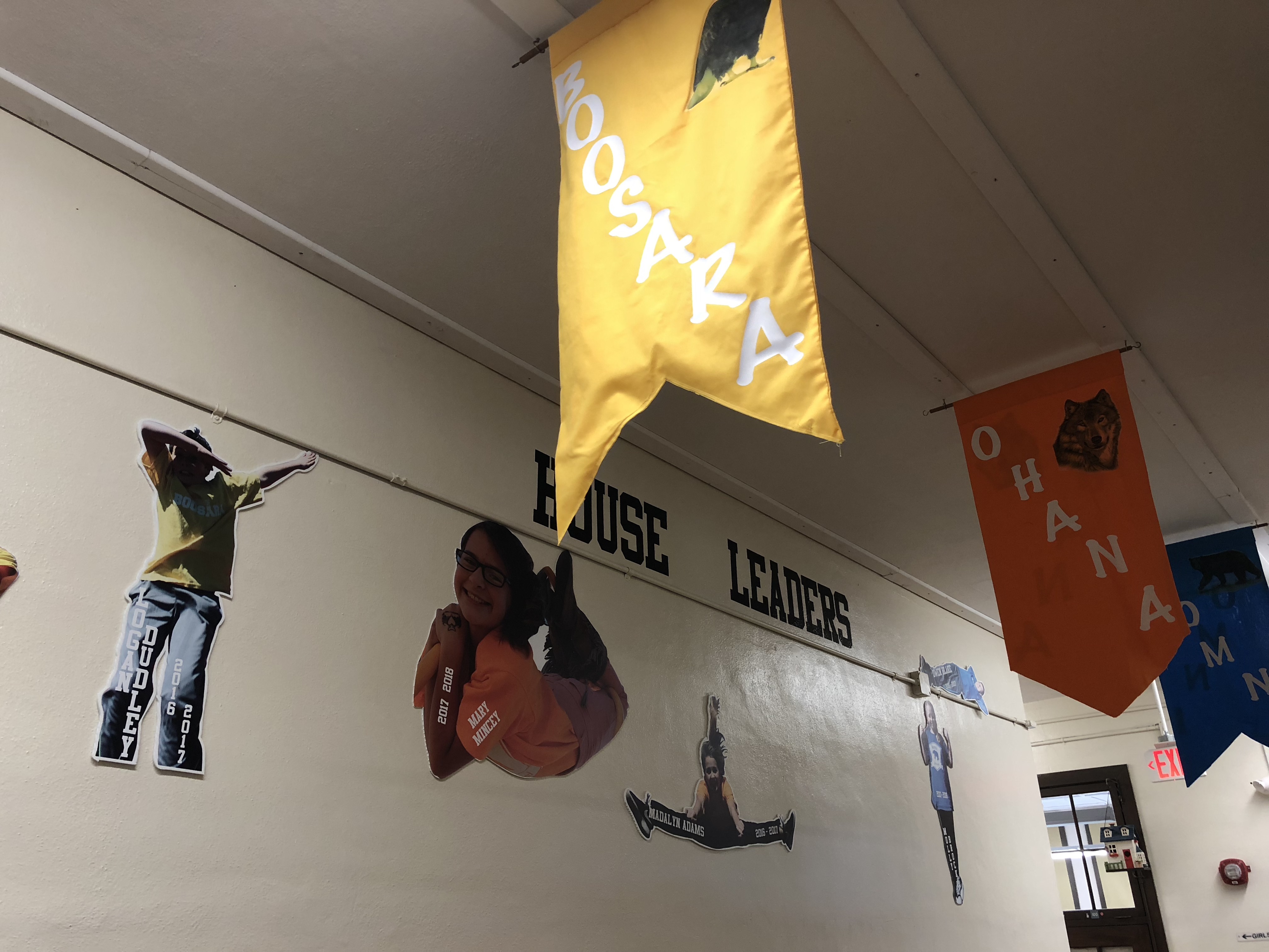 House banners are displayed in a hallway at Corryton Elementary School. 