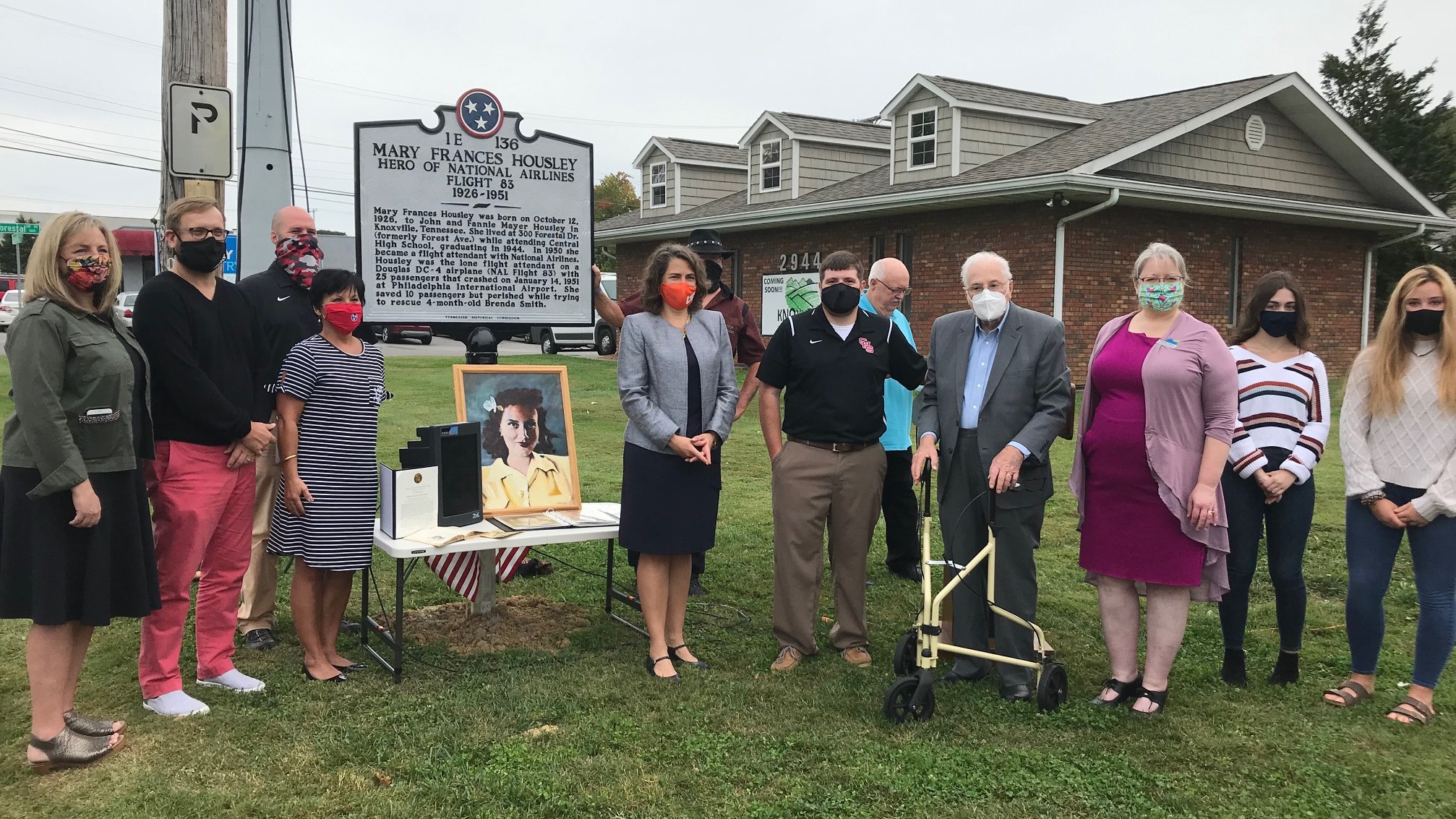 Community leaders gathered on Oct. 9 to remember Mary Frances Housley, a Central High School graduate who died in 1951, while trying ot rescue passengers from a plane crash.