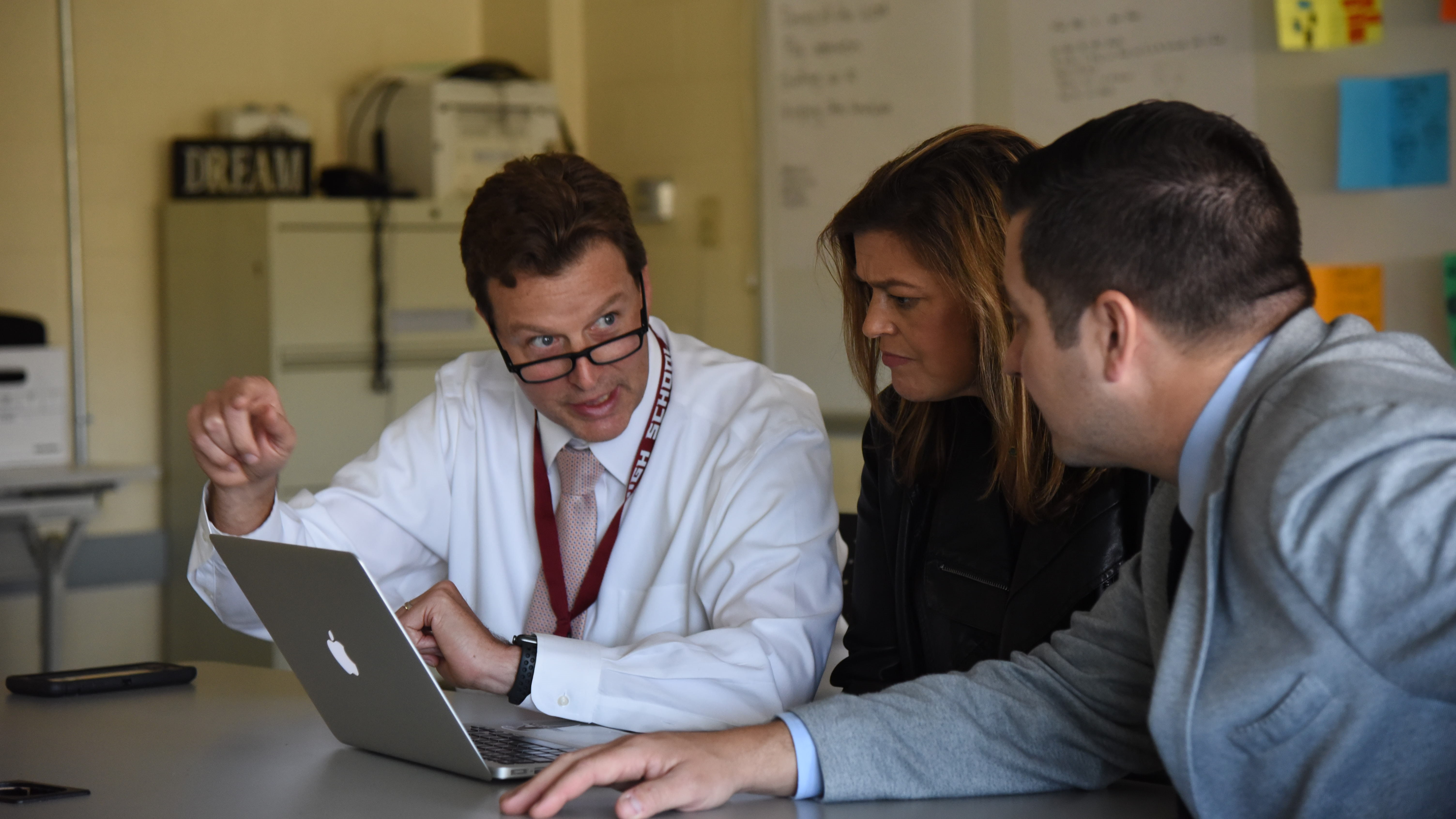 Fulton High School Principal Seth Smith speaks to McCarty Holsaple McCarty architect John Thurman and WATE News director Alison Coe during the Principal For A Day event on Nov. 11, 2019. 