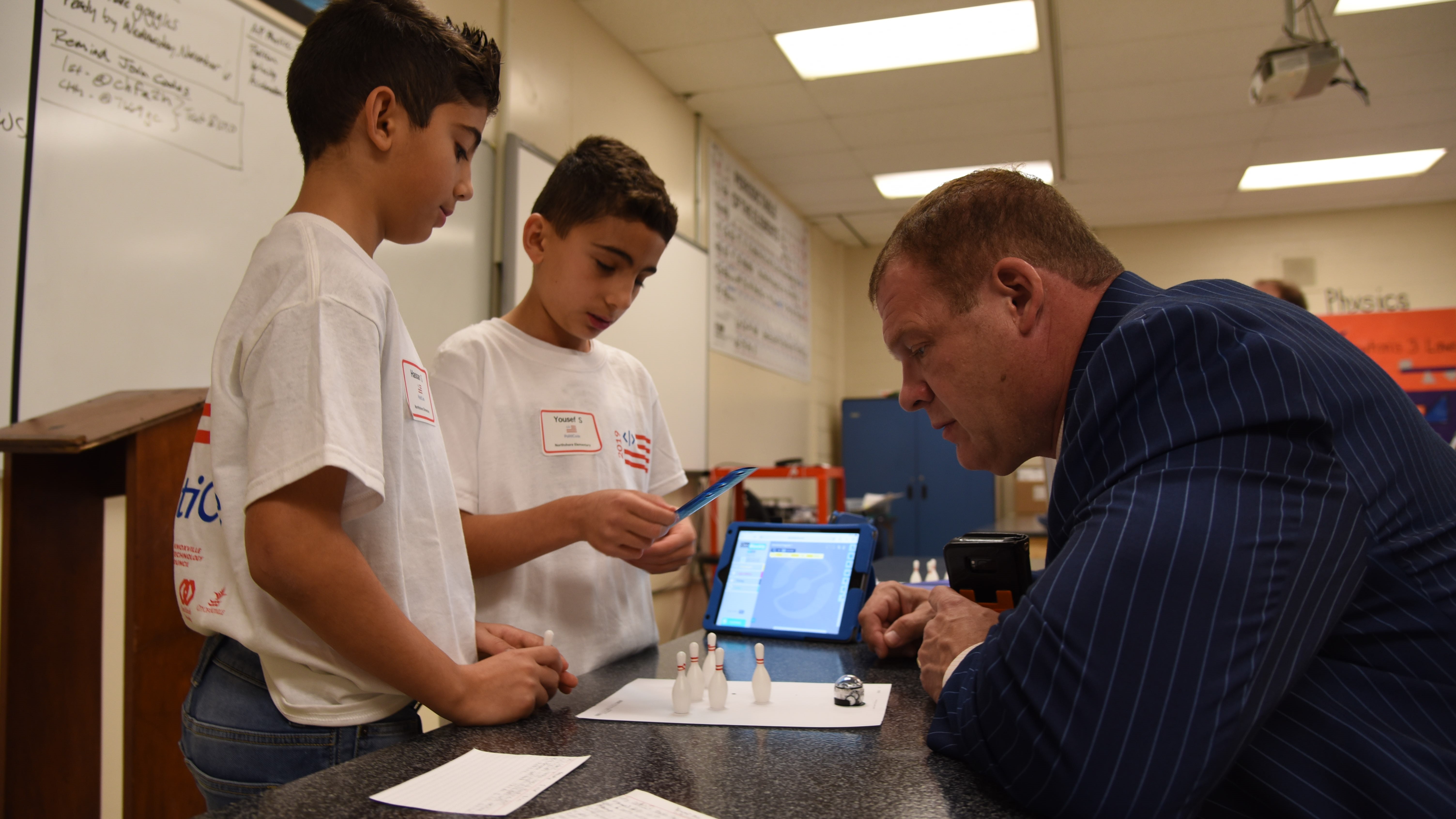 Students from Northshore Elementary demonstrate ozobots for Knox County Mayor Glenn Jacobs, during the PolitiCode event on Nov. 5, 2019. 