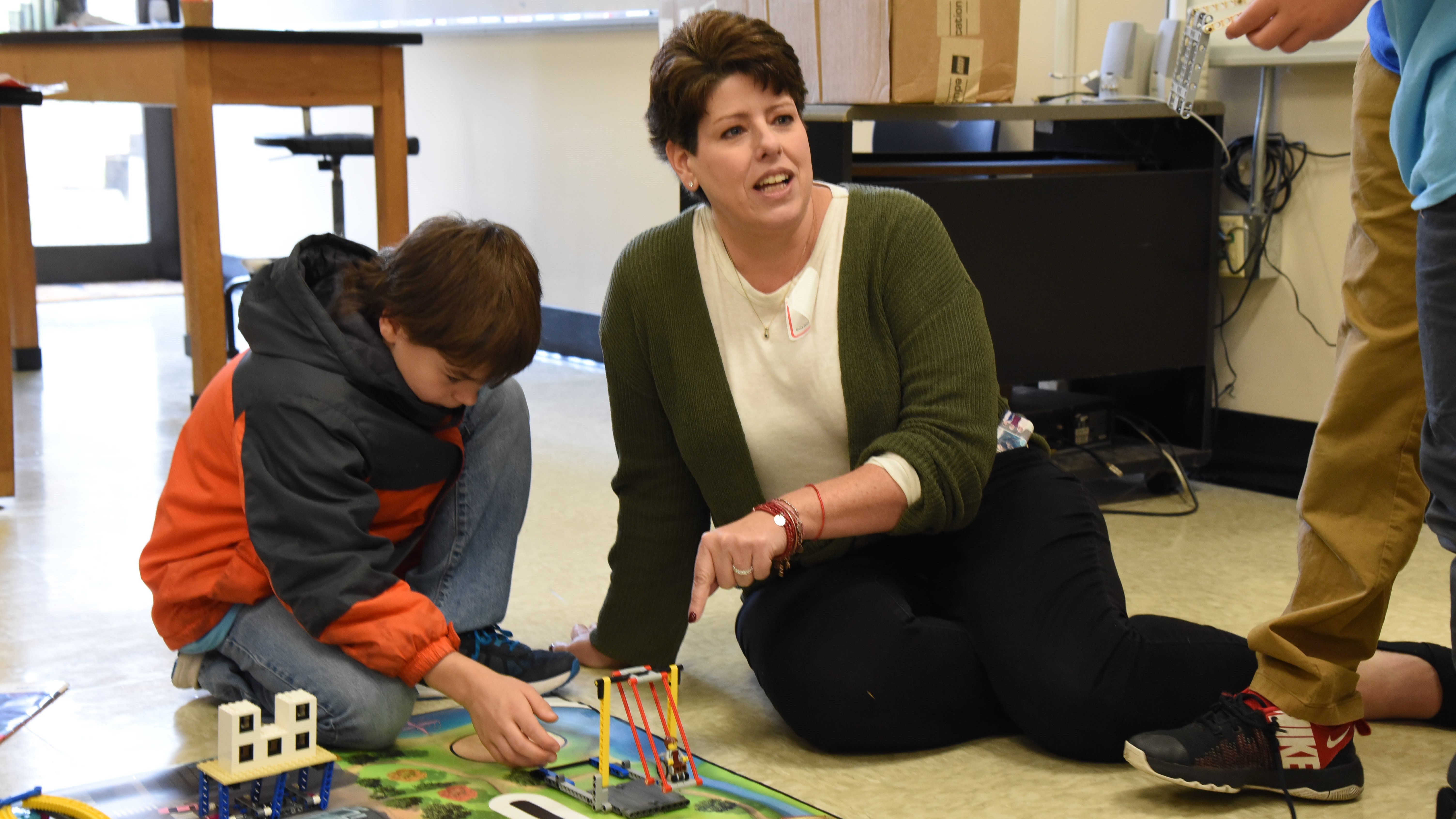 Students from Dogwood Elementary give a Lego Robotics demonstration to District 9 Board of Education member Kristi Kristy, during the PolitiCode event on Nov. 5, 2019. 