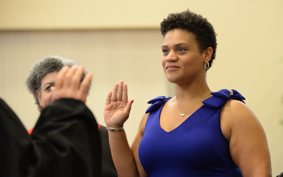 Evetty Satterfield takes the oath of office. 