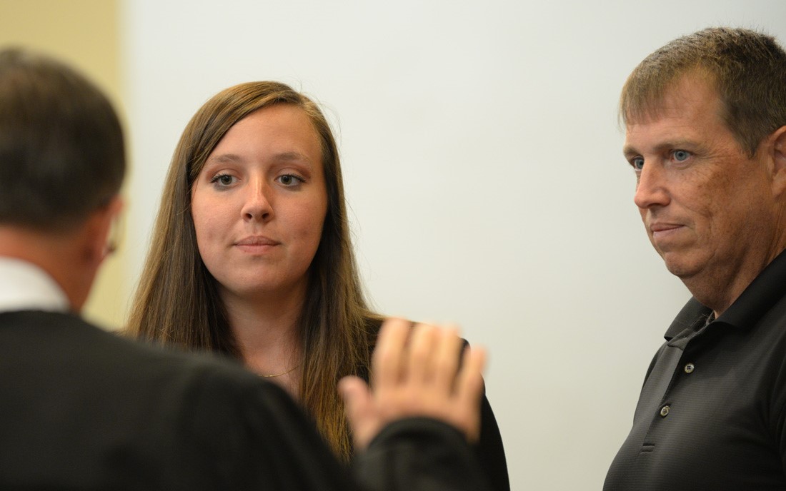 Hannah Selph takes the oath of office. 