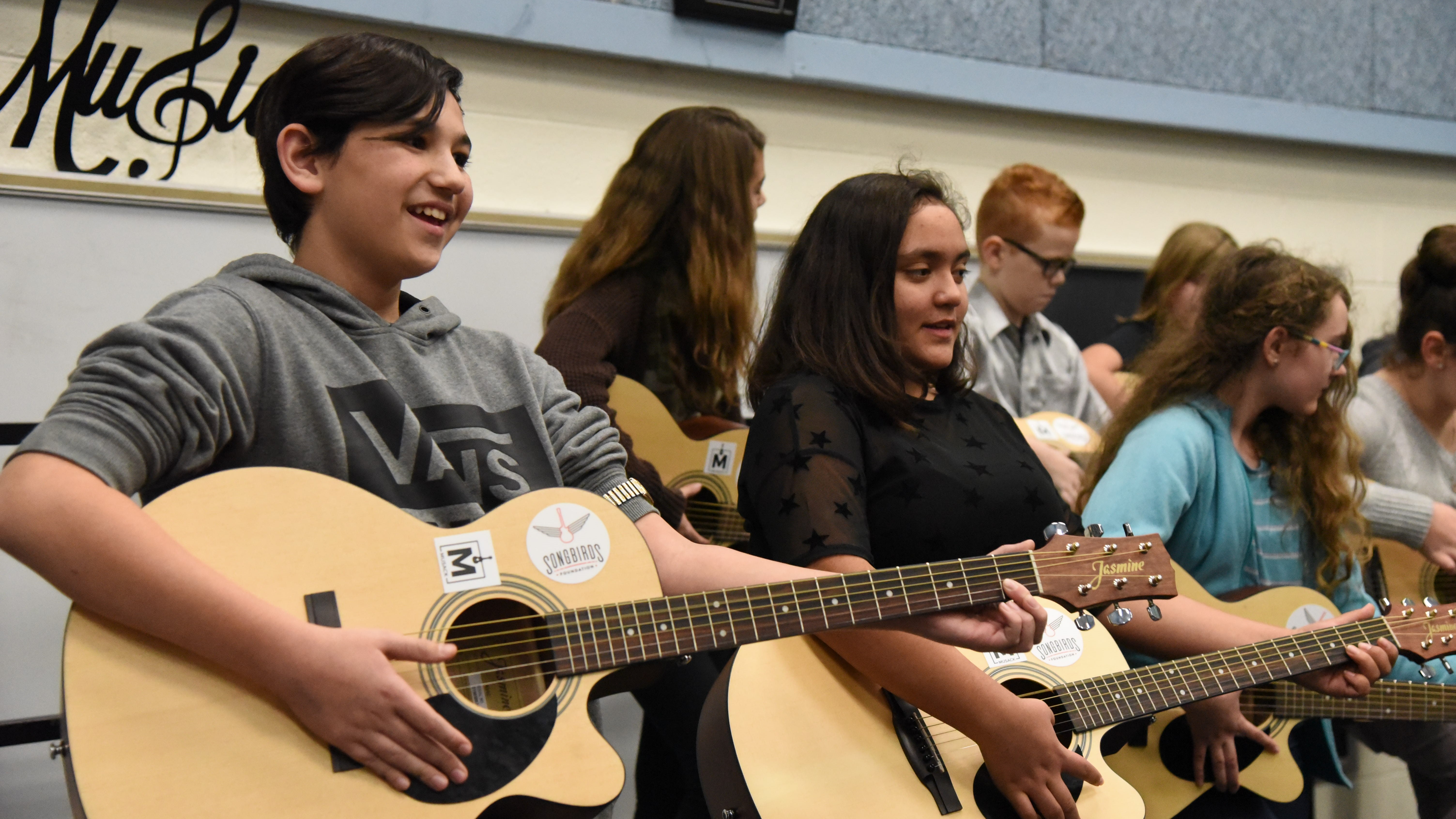 In September, the Songbirds Foundation provided 25 new guitars to Karns Middle School. Students from the school will perform at a benefit concert with Chris Blue on Dec. 19. 