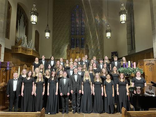 Choir students smiling
